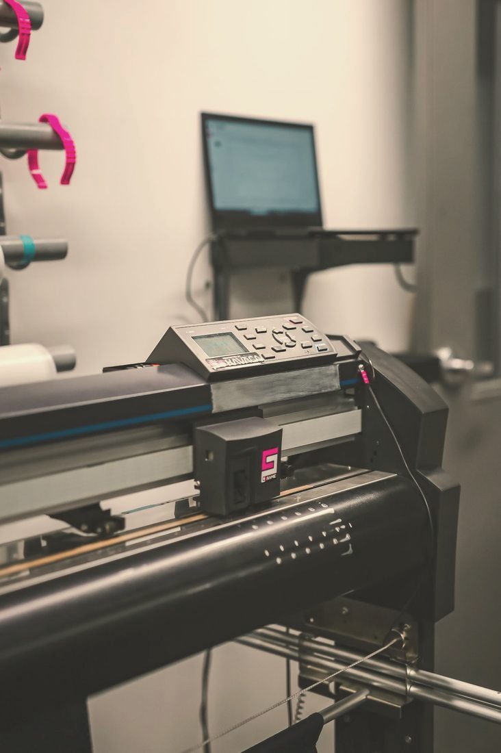 Wide-format cutting plotter in a print studio